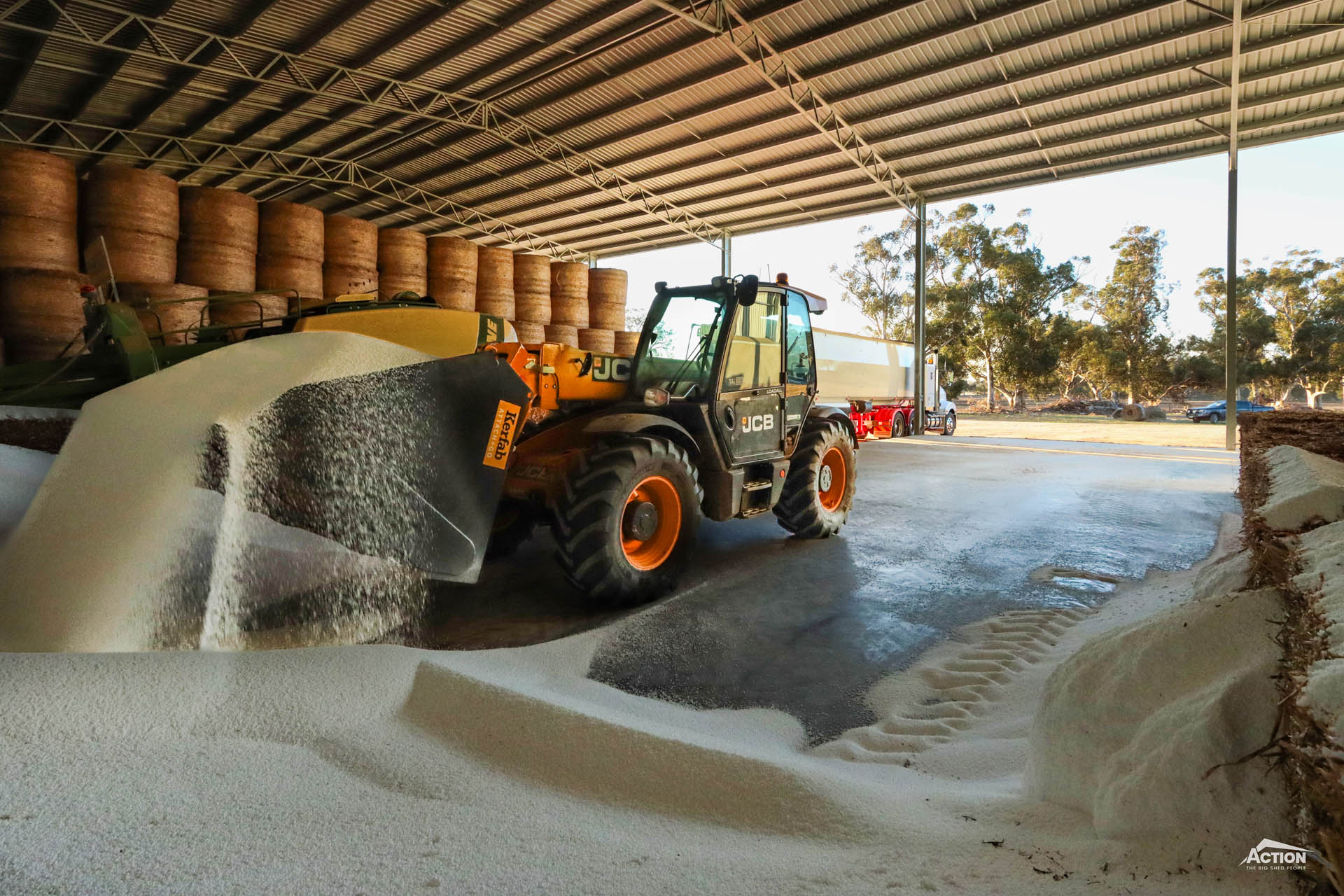 Fert Shed Vs Fertiliser Silos hay shed with concrete panels - loading