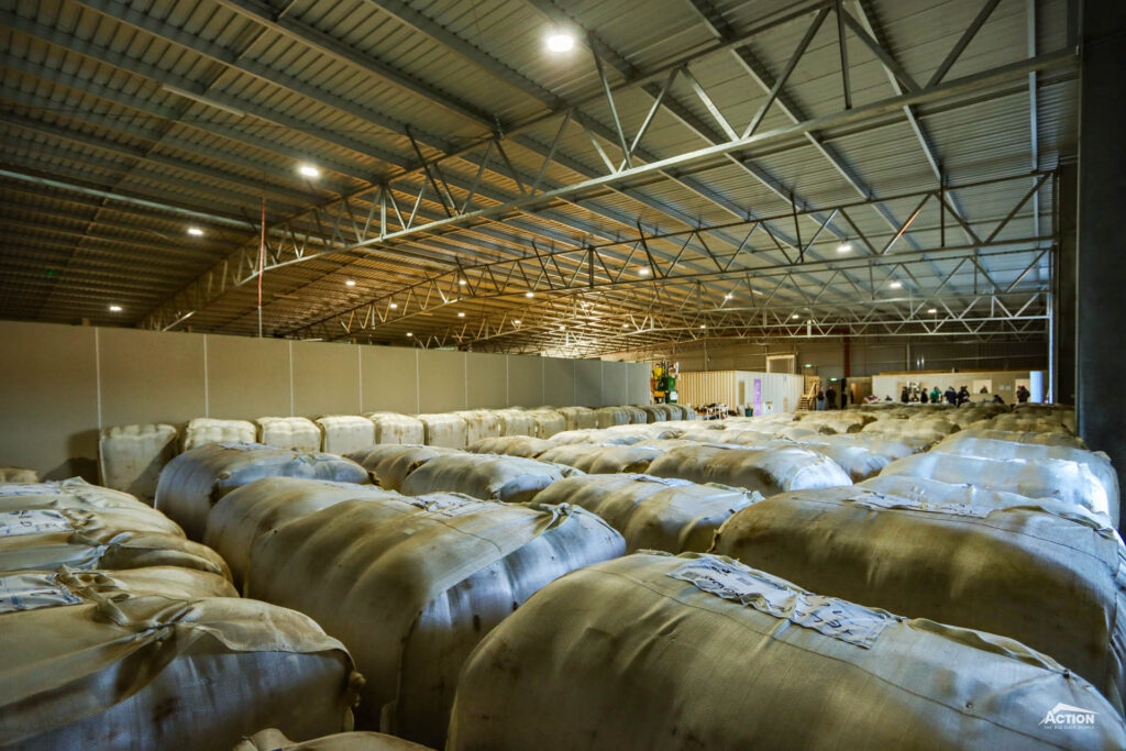 Wool bales in wool room, 12-stand shearing shed at Telopea downs